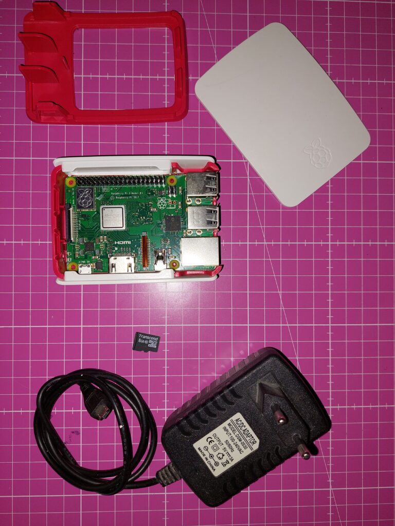 a electronic device on a pink surface